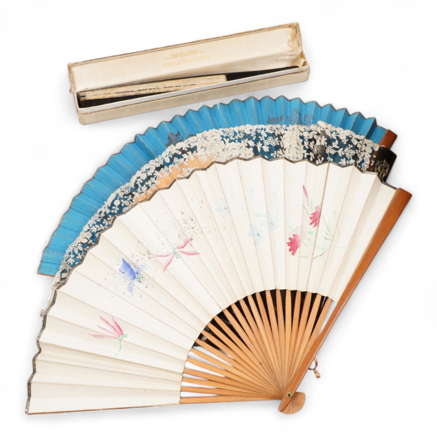 A gold mounted lace and hand painted fan and three others to include a lacquered example, one cased